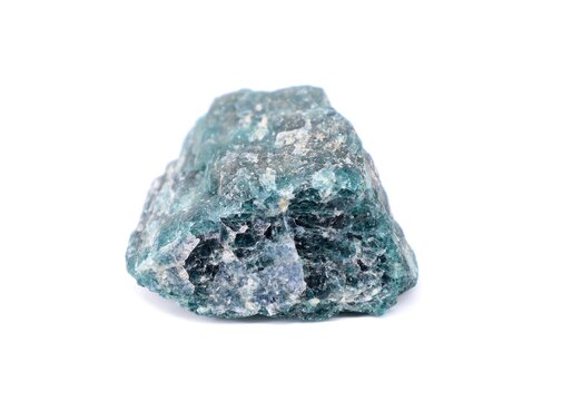 Raw green and blue Apatite on white background. It is a phosphate mineral used in industry and also as semi precious gemstone.