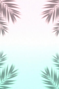 Palm tree leaves on a pastel color background. Copy space, Summer background.