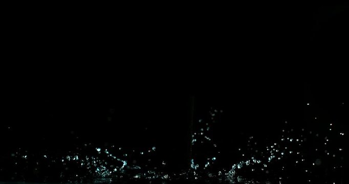Super slow motion (1000 fps) crown splash of water with hollow black center, isolated on black background. Perfect VFX overlay for product placement, clean cinematic liquid impact.
