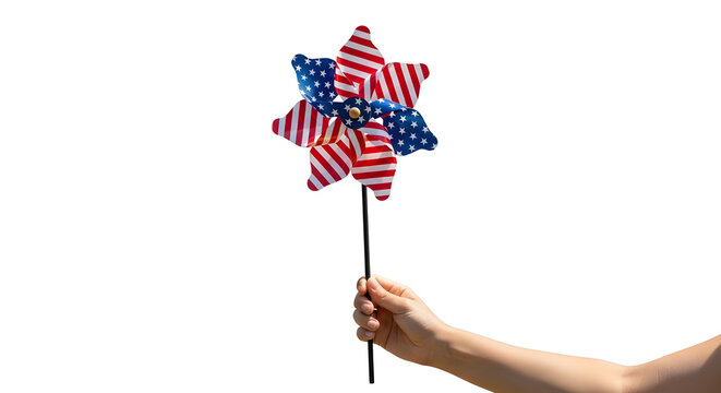 A hand holding a patriotic pinwheel with American flag design on a white background