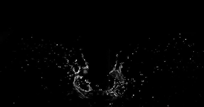 Super slow motion (1000 fps) crown splash of water with hollow black center, isolated on black background. Perfect VFX overlay for product placement, clean cinematic liquid impact.