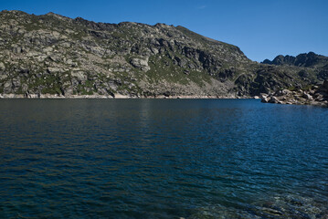 Fototapeta premium Estany Priimer de Juclar lake in Pyrenees mountains in Andorra