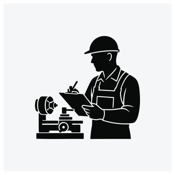 Engineer or designer using a blueprint or drawing board near a machine