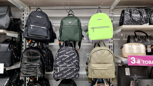 Women&rsquo;s backpacks on display in retail store