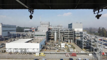 Naklejka premium Aerial View of Industrial Plant with Machinery and Equipment