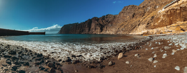 Wave on Playa de Los Guios Beach with Los Gigantes Cliffs, Tenerife, Canary Islands, Spain © Victoria Schaad