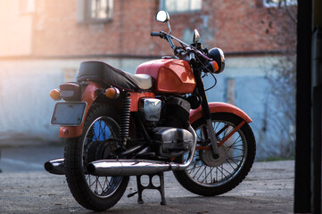 Fototapeta premium old orange retro motorcycle with a two-cylinder internal combustion engine