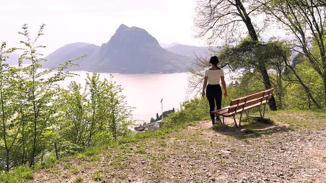 Woman Walking POV on Sentiero di Gandria Lugano, Scenic Olive Trail by Lake, Travel Lifestyle Nature Experience in Switzerland