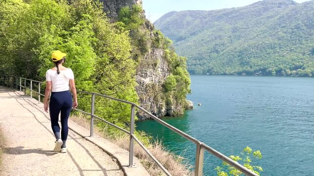 Woman Walking POV on Sentiero di Gandria Lugano, Scenic Olive Trail by Lake, Travel Lifestyle Nature Experience in Switzerland