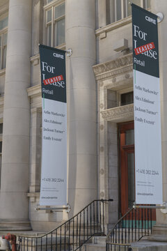 north elevation and commercial entrance to Lillian Massey Building (with For Lease banners), 125 Queens Park / 157 Bloor St W, Toronto