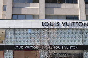 Naklejka premium exterior building and sign of Louis Vuitton, a leather goods store, located here at 150 Bloor St W, inside 89 Avenue Yorkville, Toronto