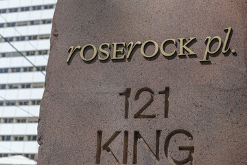 Naklejka premium granite pylon sign outside Roserock Place at 121 King St W, Toronto