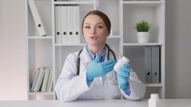 An experienced and knowledgeable healthcare professional, wearing a lab coat, carefully demonstrates safe and proper usage techniques for a wide variety of commonly prescribed medications