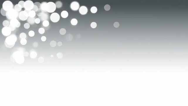 Abstract background with white glowing bokeh circles on a grey gradient