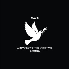 Fototapeta premium A white dove with an olive branch on a black background commemorating the anniversary of the end of WWI in Germany.