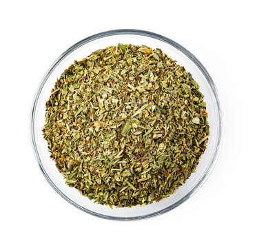 Dried oregano herb blend in a clear glass bowl
