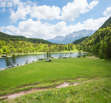 view to lake Ferchensee, spring landscape and forest, karwendel alps. upper bavaria in may