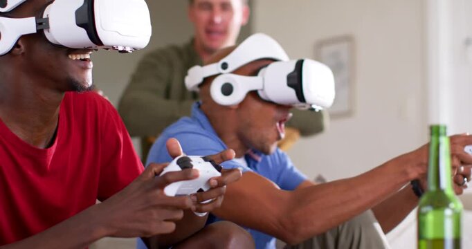 Diverse male friends starting home game man headset leaning shouting holding controller to compete