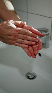Instructor Disinfects Hands Every Morning. Teacher Carefully Sanitizes Hands Daily During Mornings. Teacher Systematically Cleans And Disinfects Hands Each Morning Using Soap For Safety