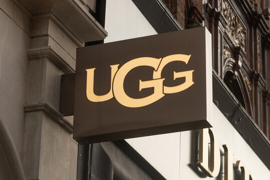 UGG store sign on retail building exterior facade