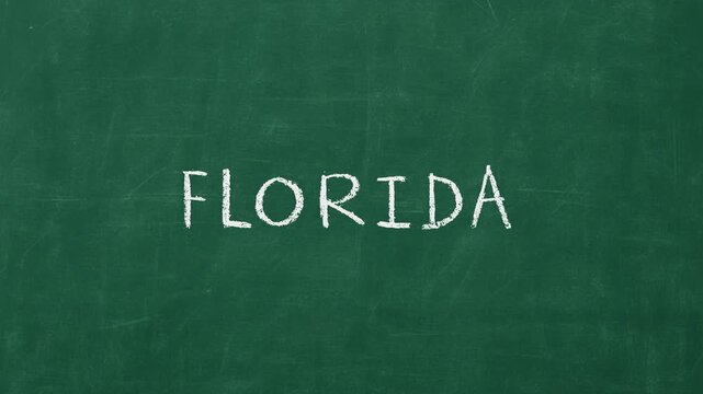 Writing the word florida on a chalkboard