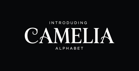 Fototapeta premium Introducing the elegant Camelia alphabet font on a sleek black background