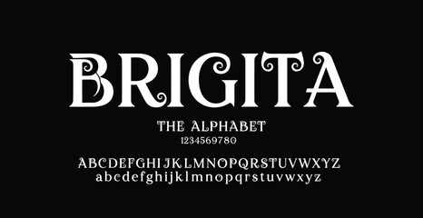 Fototapeta premium A elegant display of the Brigitta font showcasing its unique lettering style and alphabet