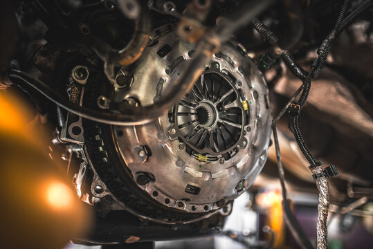 Close-up view of a car's transmission clutch assembly during repair or maintenance