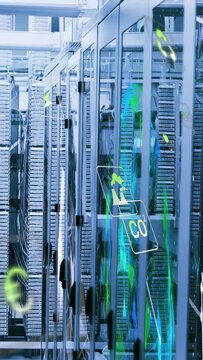 Vertical video: Camera shifting along server racks, overlays flowing and showing CO2 energy metrics