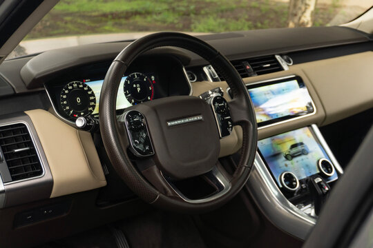 Range rover sport steering wheel and dashboard, Modern luxury car interior and driver controls