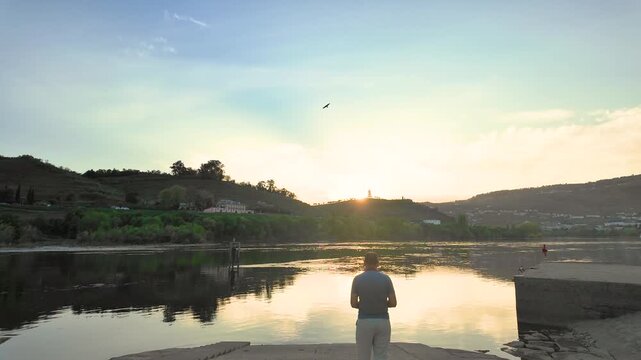 Photographer at Golden Hour: Capturing the Douro River Landscape in Portugal