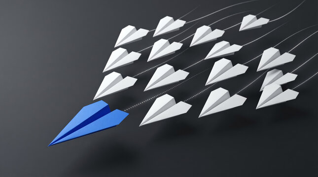 Blue paper airplane leading white ones representing unique leadership corporate vision and business direction