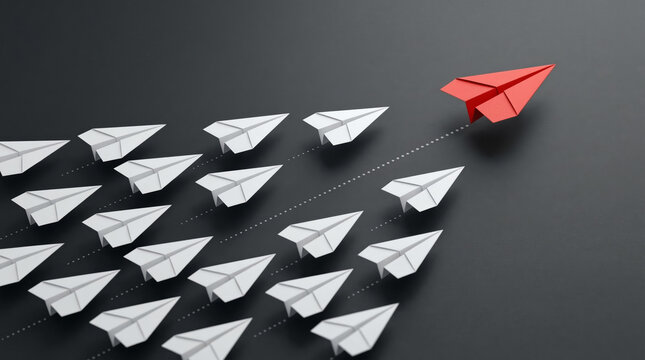Red paper airplane leading a group of white planes representing leadership business success and innovation strategy