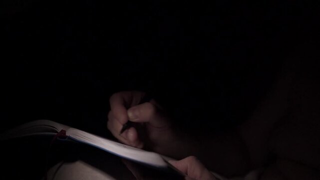 Man Journaling at Night for Self Help and Depression