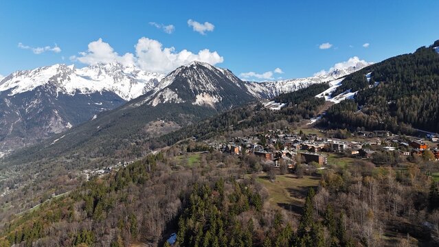 Aerial view  nature landscape of le Praz village in Courchevel ski resort by spring, French alps mountains 

