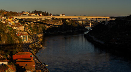 Porto city and douro river with bridges at sunset © Paul