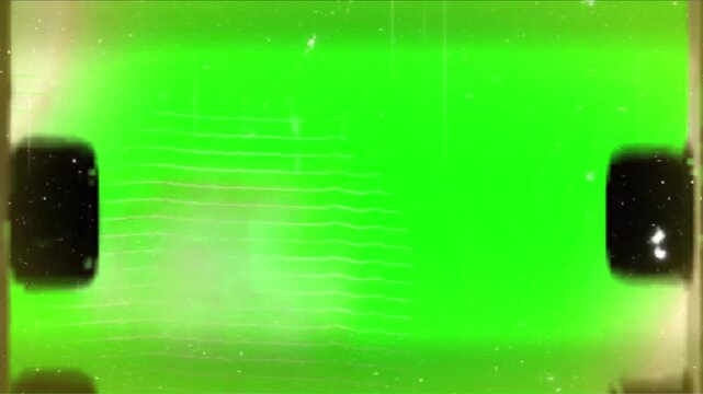 A video showcasing a vibrant green abstract background with black squares and a unique thermal pattern