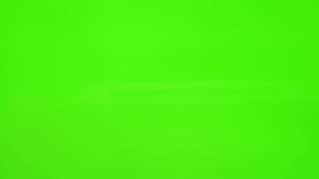 Male hand touching, making sign on document, clicking, tapping, sliding and swiping on chroma key green screen background. Different signs and gestures with fingers. 