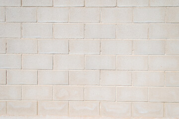 Pared de bloques de hormigón gris claro con textura uniforme. © alfonsosm