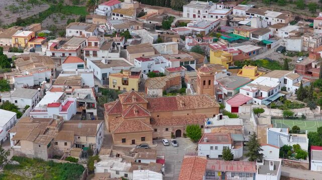 Church in the old village of Turon, Andalusia, Spain. Aerial view by drone