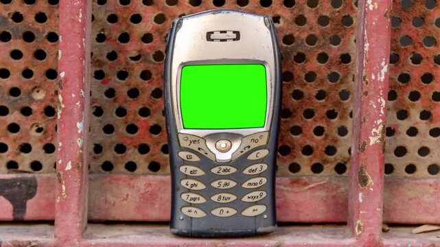 mobile telephone stop motion in urban settings with green screen