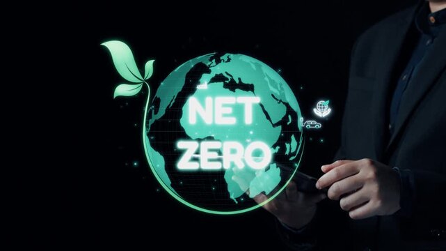 Conceptual illustration of net zero emissions featuring a globe surrounded by eco-friendly icons and green leaves with a person holding a smartphone in foreground. Qubit