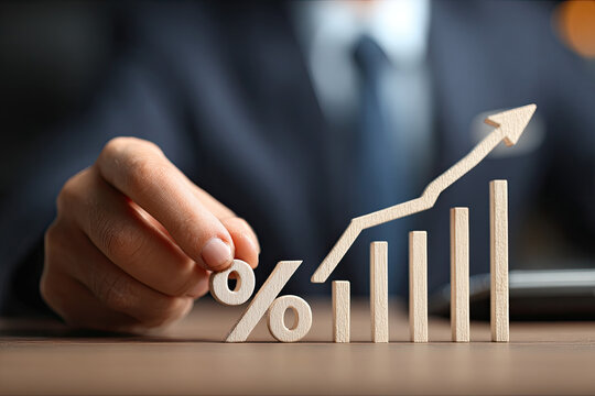 Interest rate and dividend concept,  Businesswoman calculates investment returns with percentage symbol and up arrow, return on stocks and mutual funds, long term investment for retirement.