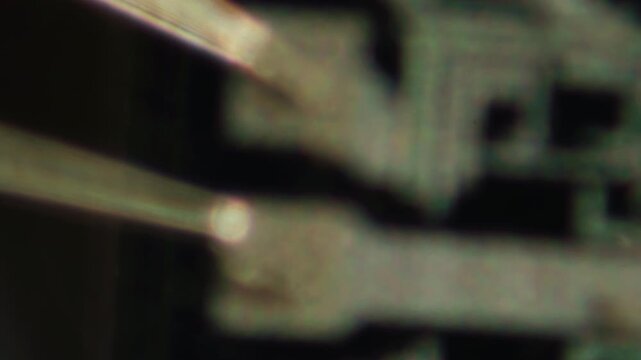 Macro Close-up Shot of Microchip, CPU Processor on Printed Circuit Board, Computer Motherboard with Components Inside of Electronic Device, Part of Supercomputer microscop.