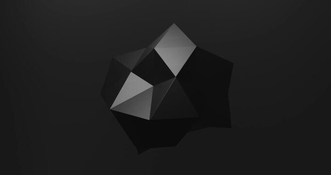 Dark abstract geometric polygon on black background looping animation