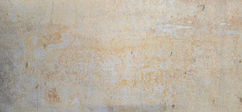 Textured Plaster Wall Background With Aged Yellow Beige Paint and Distressed Surface for Backdrops
