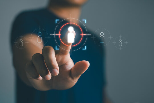 Personalization marketing, target customer, buyer persona, marketing segmentation, job recruitment concept. customer centric strategies. Person hand touching virtual icon focused on target customer.