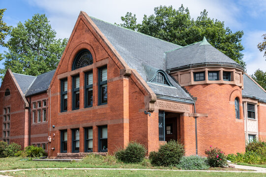 view to Hubbart memorial in Ludlow, a rhistoric ed brick building.