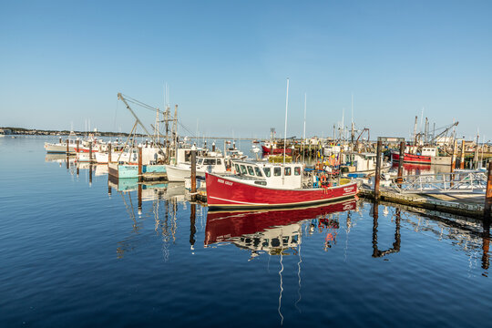 people enjoy a warm summer day in the historic part of Provincetown