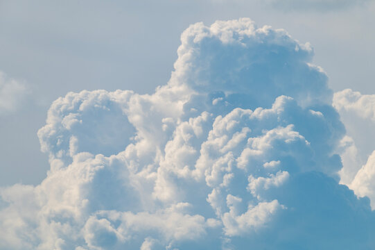 Cumulus clouds in blue sky